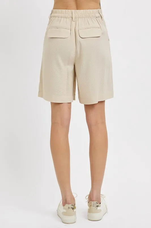RISEN High Rise Pleated Front Shorts by Trendsi