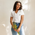 Women’s relaxed v-neck t-shirt by Rooted Wellness